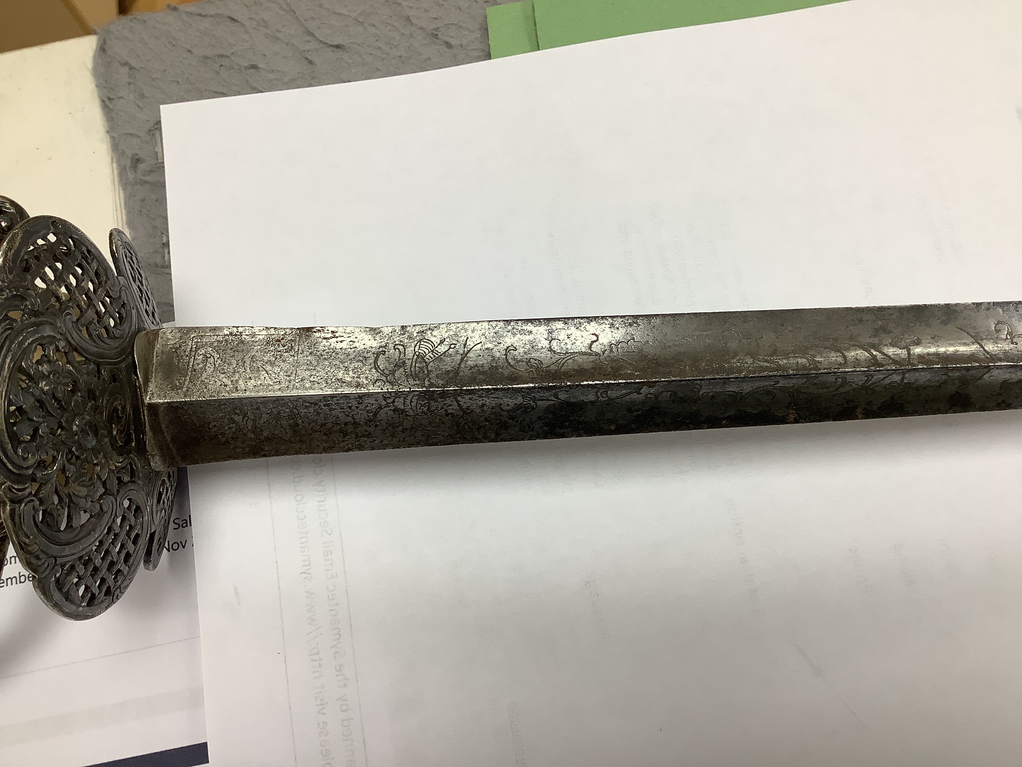 A French silver hilted small sword, c.1770, the ricasso rings have two tiny marks struck on the end which possibly could be Paris discharge marks, the hilt pierced with basketweave decoration and flowers, silver wire and